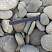 Kamenclub.ru: Галька речная плоская (серо-белая) фр. 70-120 мм. купить  в Петрозаводске галька галечник речной серый, белый окатанная плоская  природная галька 9000 руб/т   фото КАМЕНЬ КЛУБ